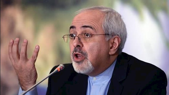 Zarif praising a criminal leader of Hezbollah and laying flowers on his grave on behalf of Rouhani