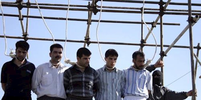 Iran hangs 5 prisoners, one in public