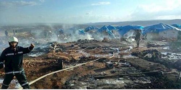 Air strikes on camp for displaced Syrians kill 28, monitor says