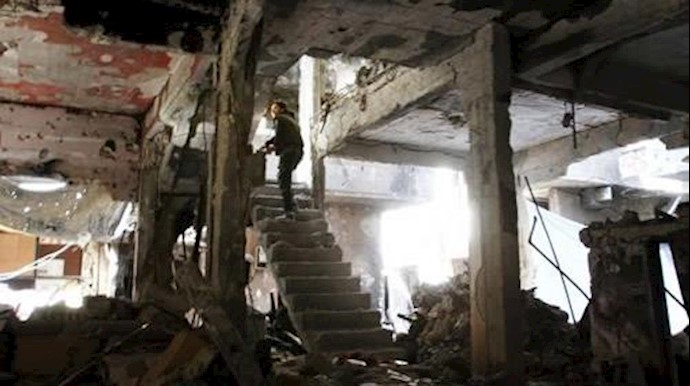 Assad forces use barrel bombs against a refugee camp near Damascus