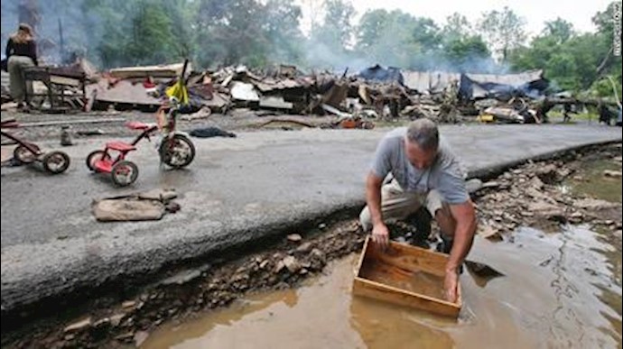 US worst floods kill 23 in W. Virginia, not seen in a century