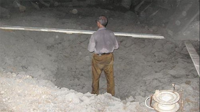  'Scene of crater made in the ground from major missile attack on Camp Liberty'