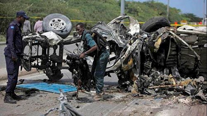 Twin suicide bombs claimed by al Shabaab kill 20 people in Somalia (Audio+photos)