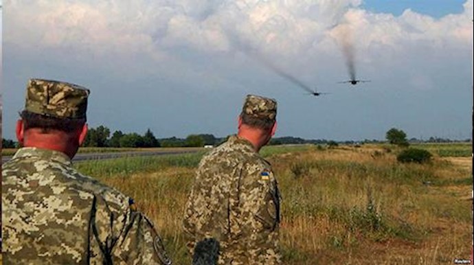 (Video) Putin flies into Crimea amid war games and tension