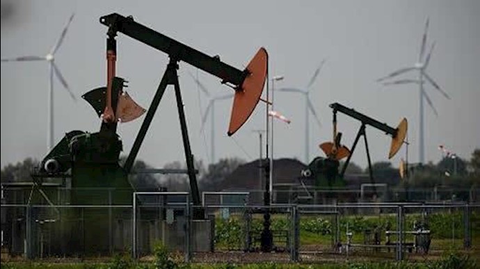 Oil down modestly; late short-covering limits dollar impact