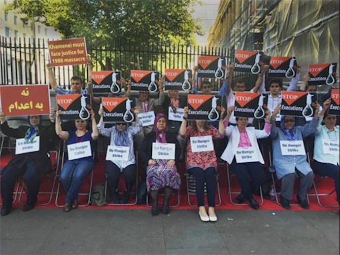 Iranian opposition activists launch hunger strike, stage mock hanging outside Downing Street to protest executions in Iran
