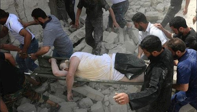 Monitoring group: At least 12 more die in Aleppo airstrikes + Photos