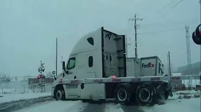 Dramatic crash, trailer cut in half by train, no one killed