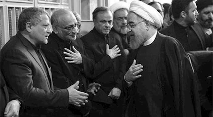  'President Rouhani greeting Mohsen Hashemi, son of Akbar Hashemi Rafsanjani, who died Sunday '