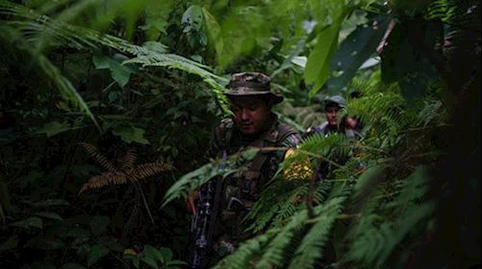Colombia’s FARC rebels march one last time, to demobilization camps