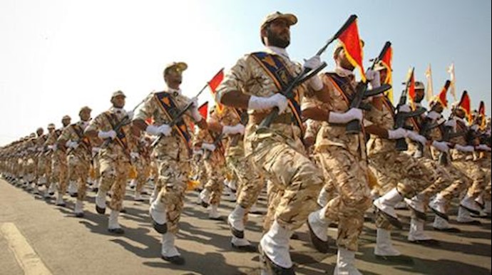  'IRGC members march during a parade in Tehran, on September 22, 2011'