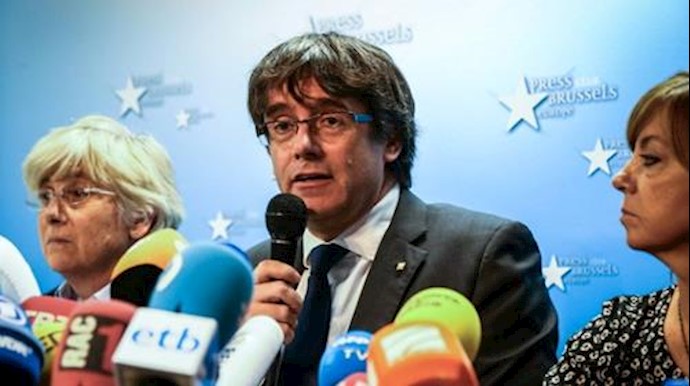 Sacked Catalan leader turns himself in to Belgian police