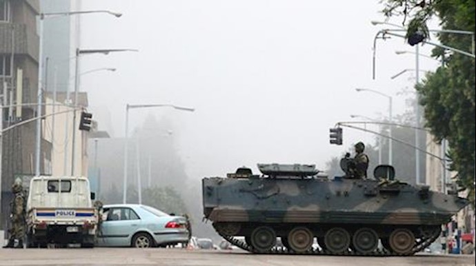 Zimbabwe army launches takeover against ‘criminals’ around Mugabe, says president ‘safe’