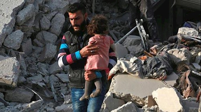 More than 60 killed in air strike on Syrian market town