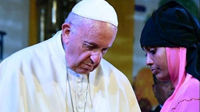  'Pope Francis meets with a Rohingya refugee during an interreligious meeting at the Archbishops house in Dhaka on December 1, 2017'