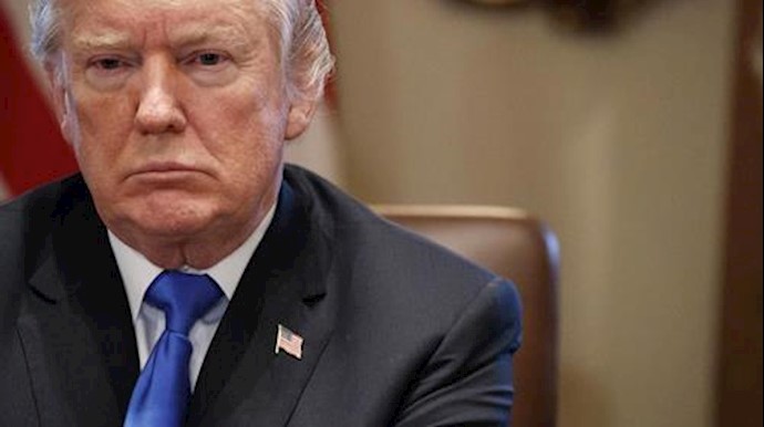  'President Donald Trump listens during a cabinet meeting at the White House, Wednesday, Dec. 20, 2017, in Washington.'