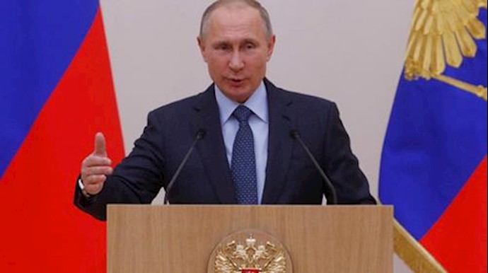  'Russian President Vladimir Putin addresses officials of Rostec high-technology state corporation at the Novo-Ogaryovo state residence outside Moscow'