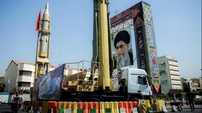  'A display featuring missiles and a portrait of Khamenei is seen at Baharestan Square in Tehran'