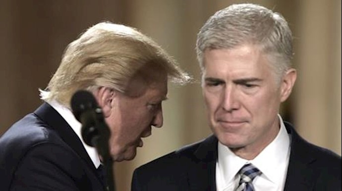  'Judge Neil Gorsuch speaks with US President Donald Trump after he was nominated for the Supreme Court on January 31, 2017'