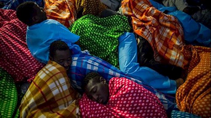 Thirteen dead migrants found in shipping container in Libya