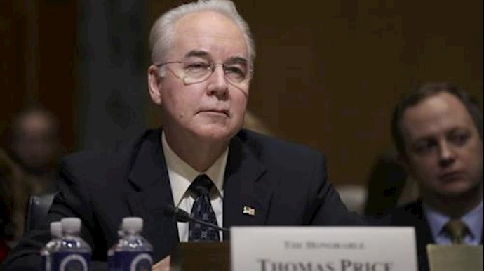  'U.S. Rep. Tom Price (R-GA) listens to opening remarks prior to testifying before a Senate Finance Committee confirmation hearing '