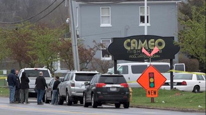  'Police and Bureau of Alcohol, Tobacco and Firearms (ATF) personnel attend the scene of a mass shooting at the Cameo Nightlife club in Cincinnati, Ohio'