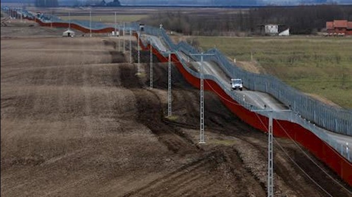  'The Hungarian border fence. (Reuters)'