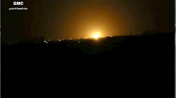  'Flames rising after an explosion near an airport west of Damascus, Syria, Thursday, April 27'