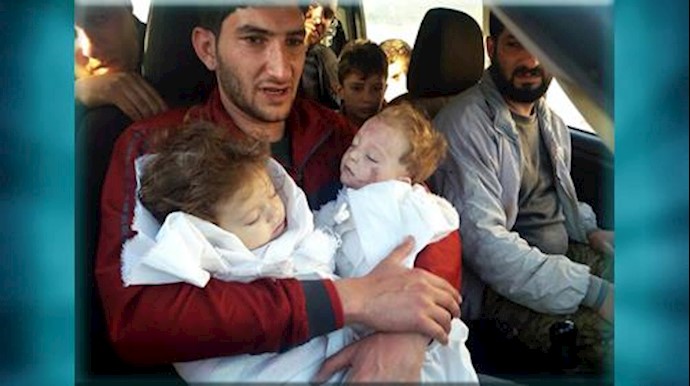 A father bids farewell to twin toddlers after Syria attack