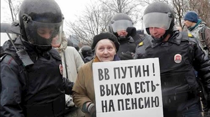 Russian rallies urge Putin not to run again; dozens arrested