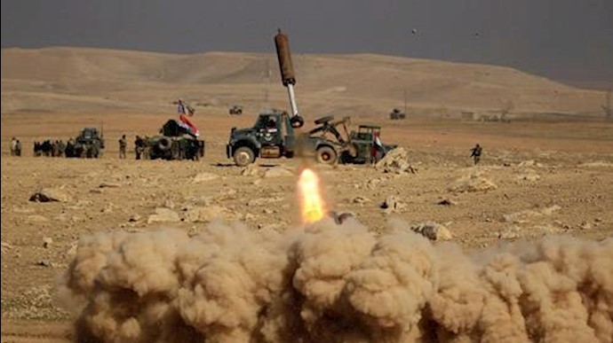  'Members of the Iraqi rapid response forces fire a missile toward ISIS militants in the south of Mosul on February 19, 2017'