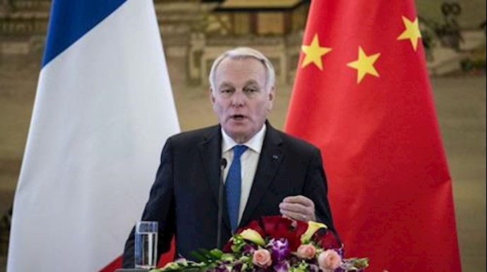  'Ayrault speaks to journalists during a press conference in Beijing on April 14'