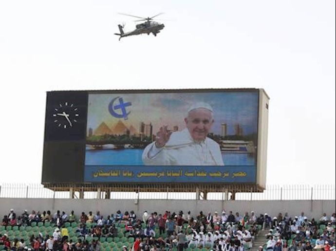 Pope Francis leads Cairo Mass as helicopter gunship and armed police keep watch
