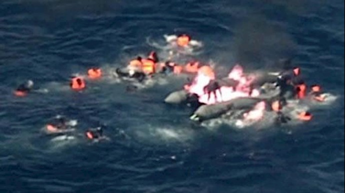 Migrants rescued from burning boat