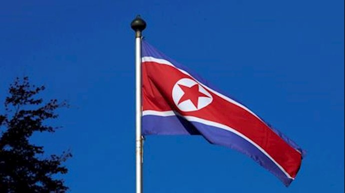  'A North Korean flag flies on a mast at the Permanent Mission of North Korea in Geneva October 2, 2014. REUTERS'