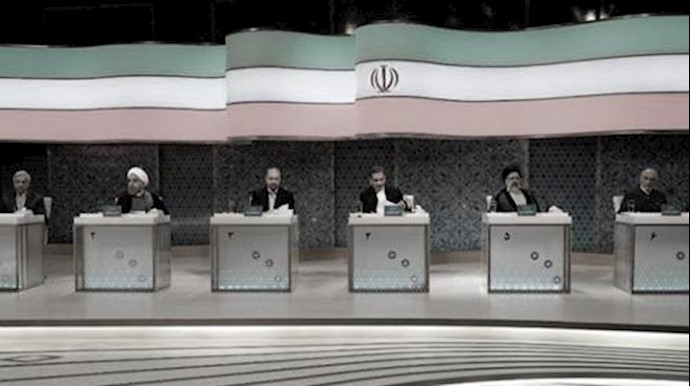 Rouhani rounds on hardliner rivals in last TV debate before Iranian election