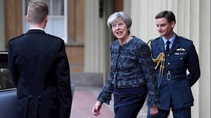 May takes tough Brexit stance as UK holds local elections