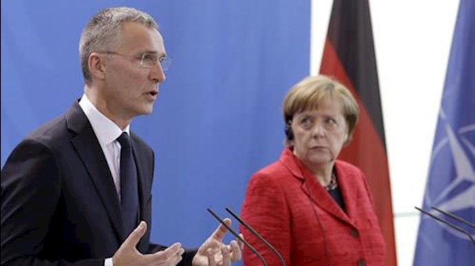  'German Chancellor Angela Merkel, right, and NATO Secretary General Jens Stoltenberg, left, at joint press conference in Berlin, Germany'