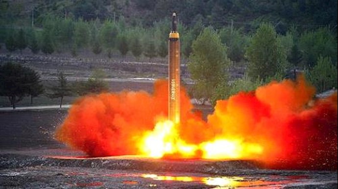  'The long-range strategic ballistic rocket Hwasong-12 (Mars-12) is launched during a test.'