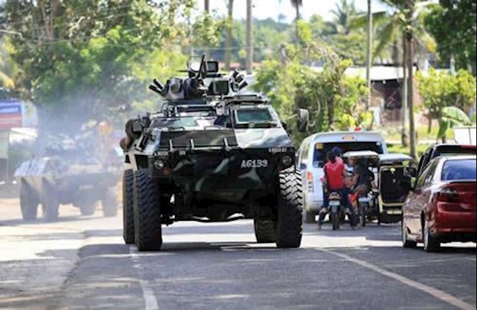 Thousands flee Philippine city after rebel rampage claimed by Islamic State