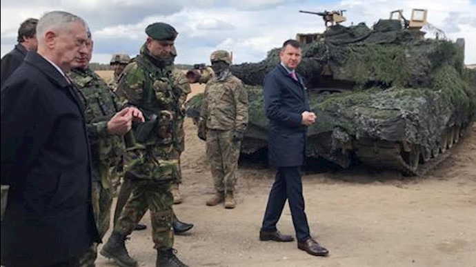  'United States Defense Secretary Jim Mattis (L) tours Pabrade military training area in Lithuania, May 10, 2017'