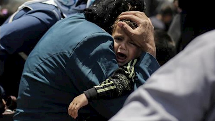  'A child cries onboard a ferry crossing the Tigris River, in Mosul, Iraq. (File photo)'