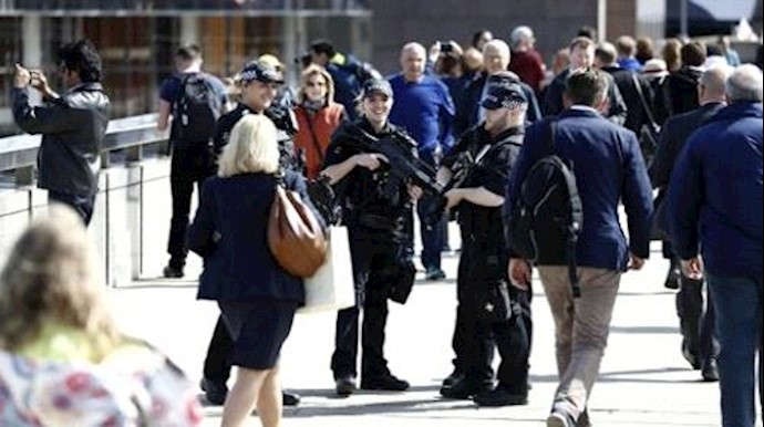 Three arrests in London terror probe on election eve