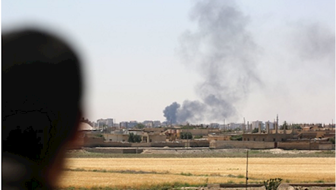 US-backed forces clash with IS group in battle for Raqqa