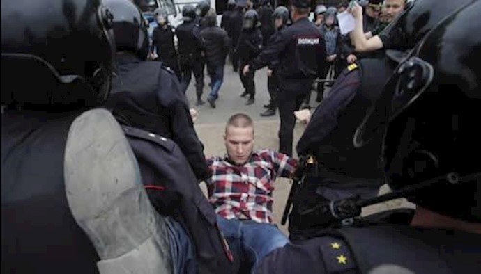 Russian police detain Putin critic Navalny, scores of protesters held