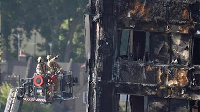 British PM May faces mounting criticism over London tower block blaze