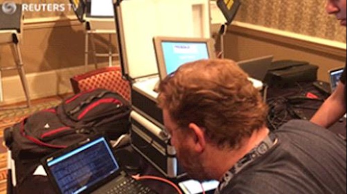 Hackers scour voting machines for election bugs