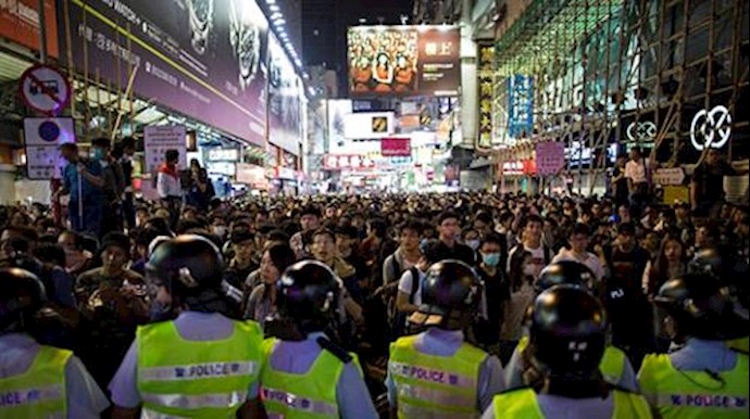 China police warn against illegal gatherings after rare Beijing protest