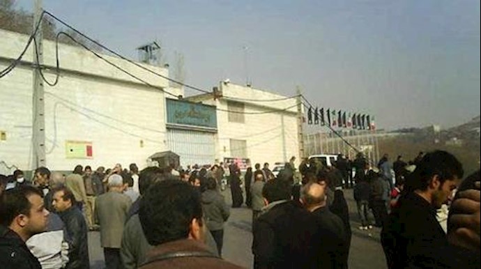  'Picture shows family members outside the Evin prison.'