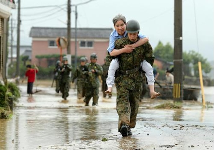 Huge floods sweep southern Japan, two dead, 20 missing